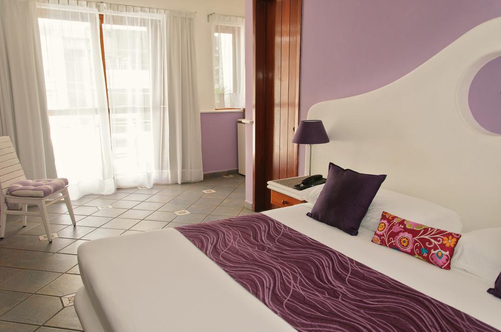 Hotel Boutique Quinto Sol Playa del Carmen Quarto foto